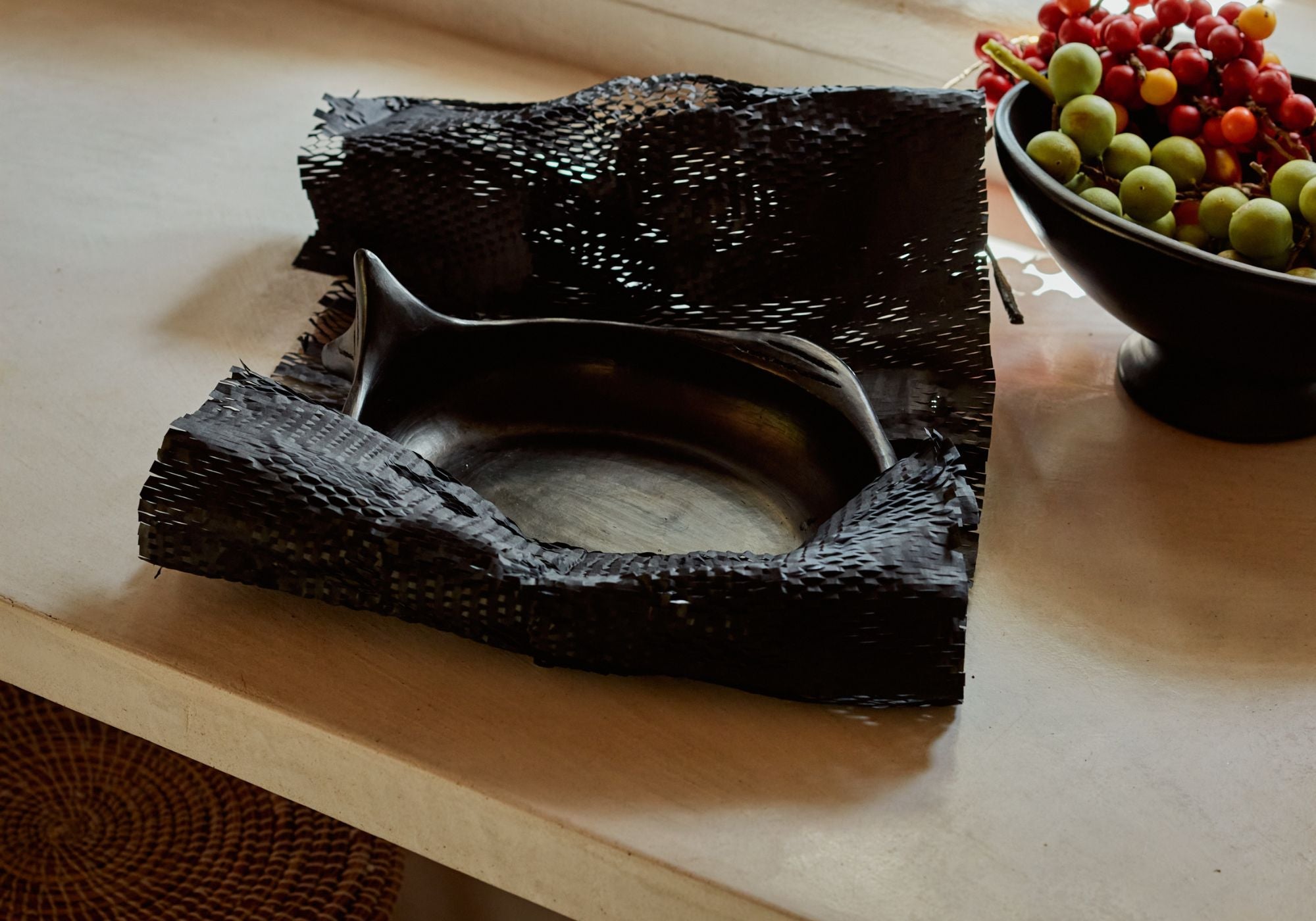 Women caring for chamba pottery tray