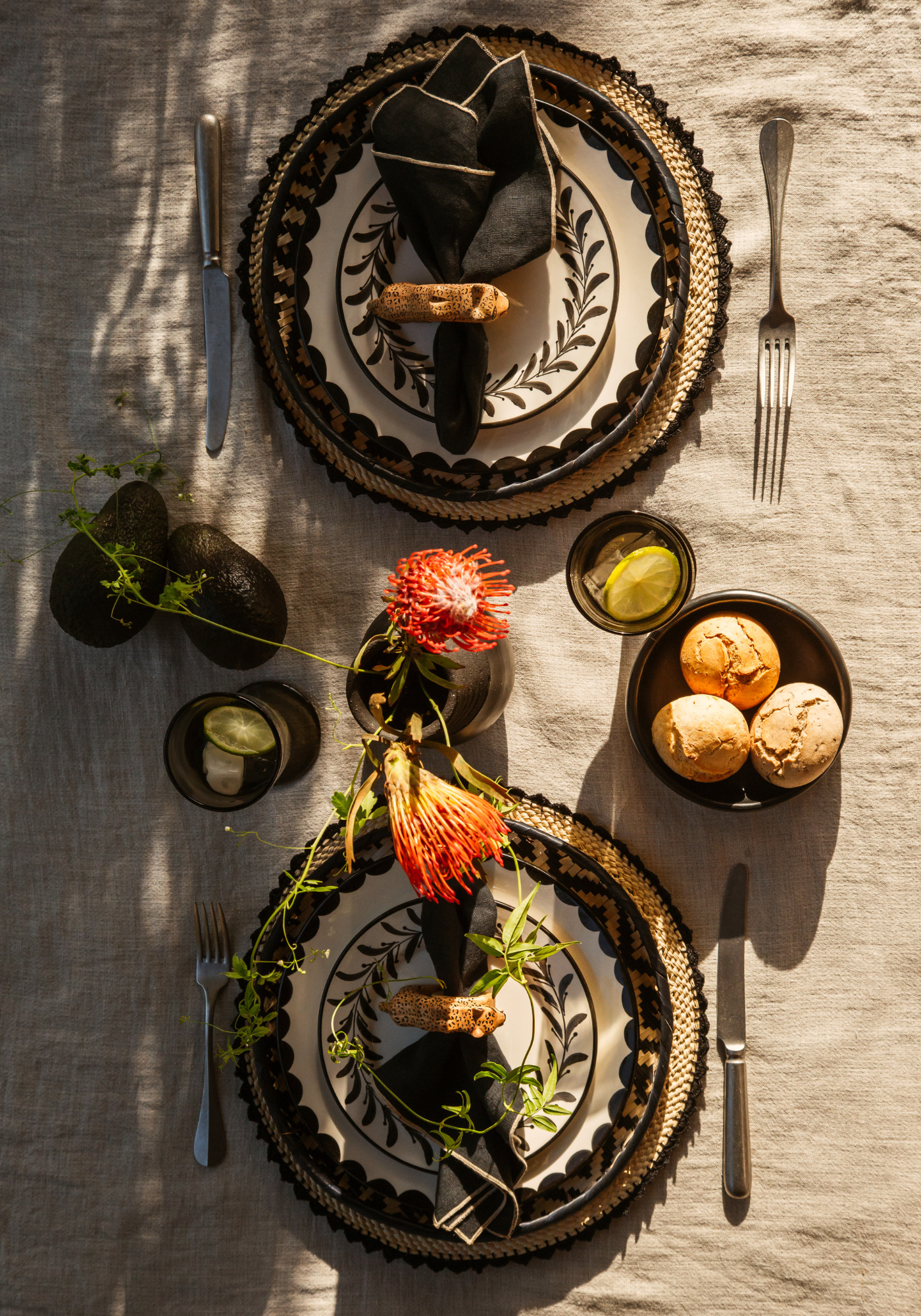 Wild Dinner tablescape featuring pieces styled in a mood setting.