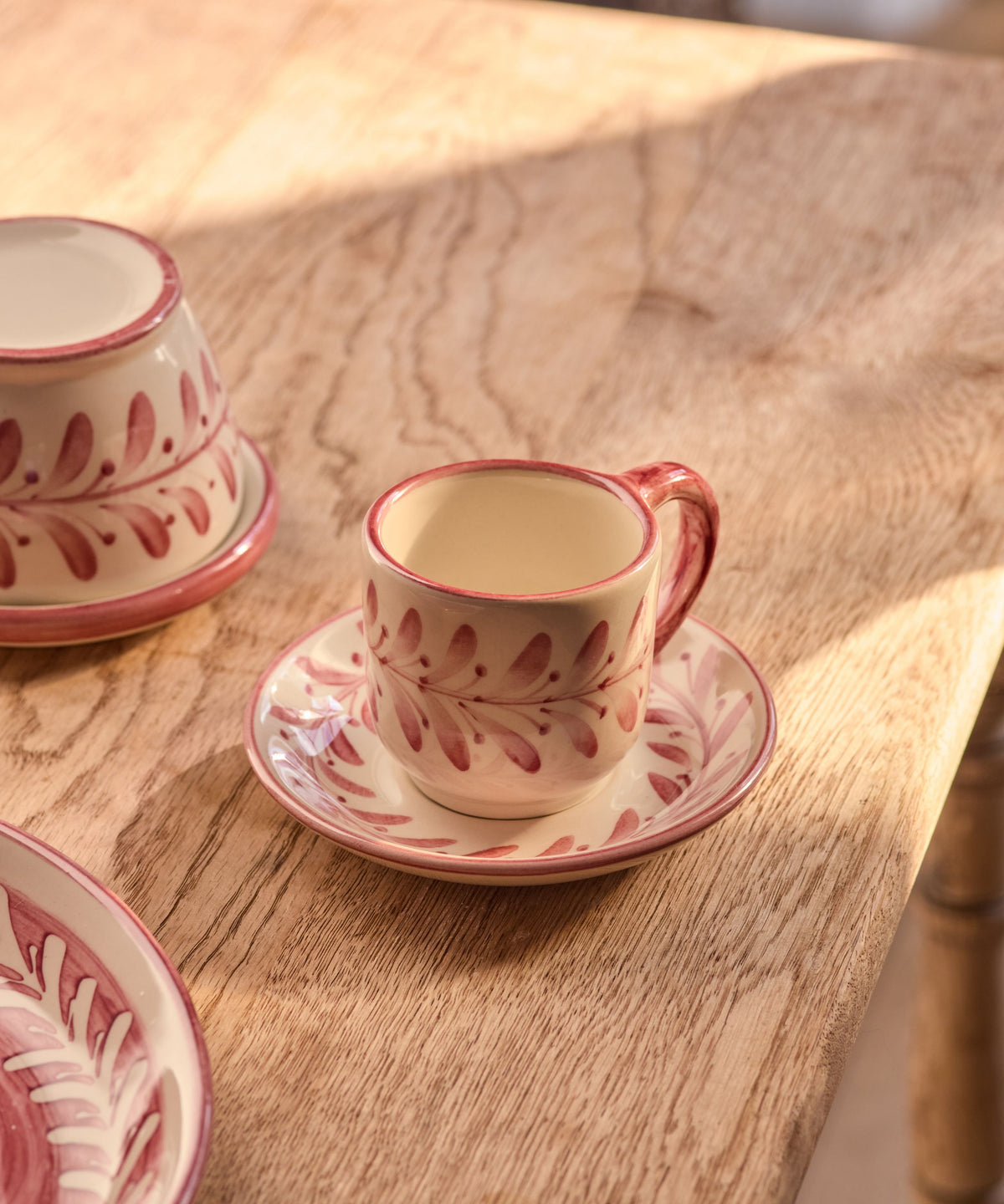 Vintage Rose Helecho espresso cup and saucer with freehand fern wreath, hand-painted ceramic