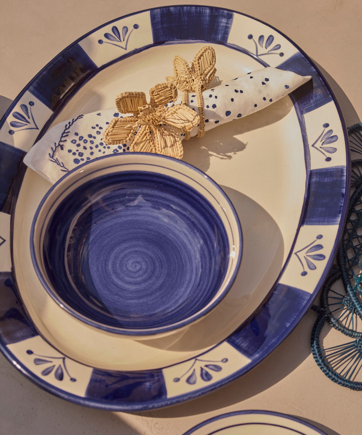 Deep Blue Flor de Lis extra large serving platter on the table, hand-painted floral ceramic