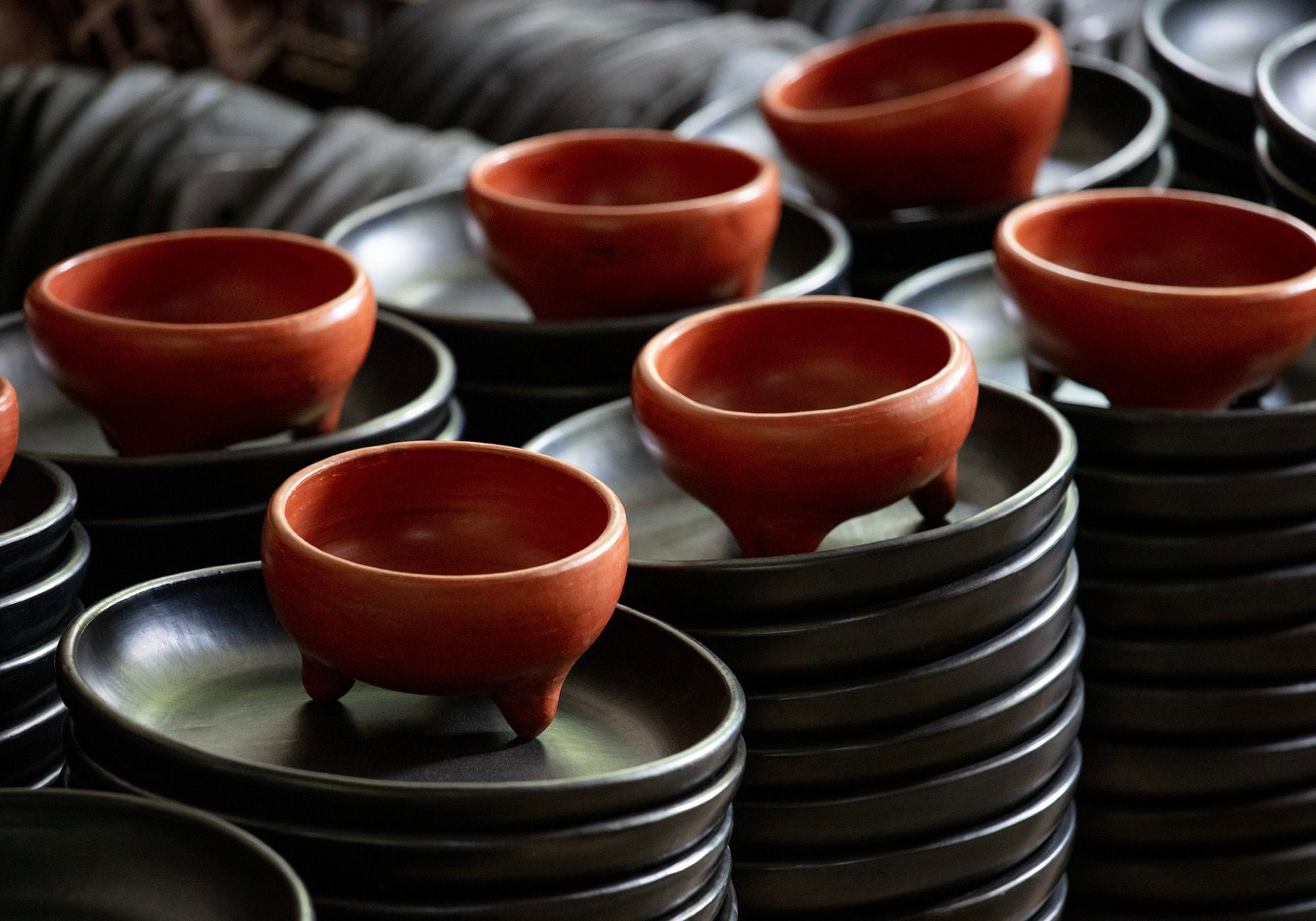 A qoman making a chamba pot