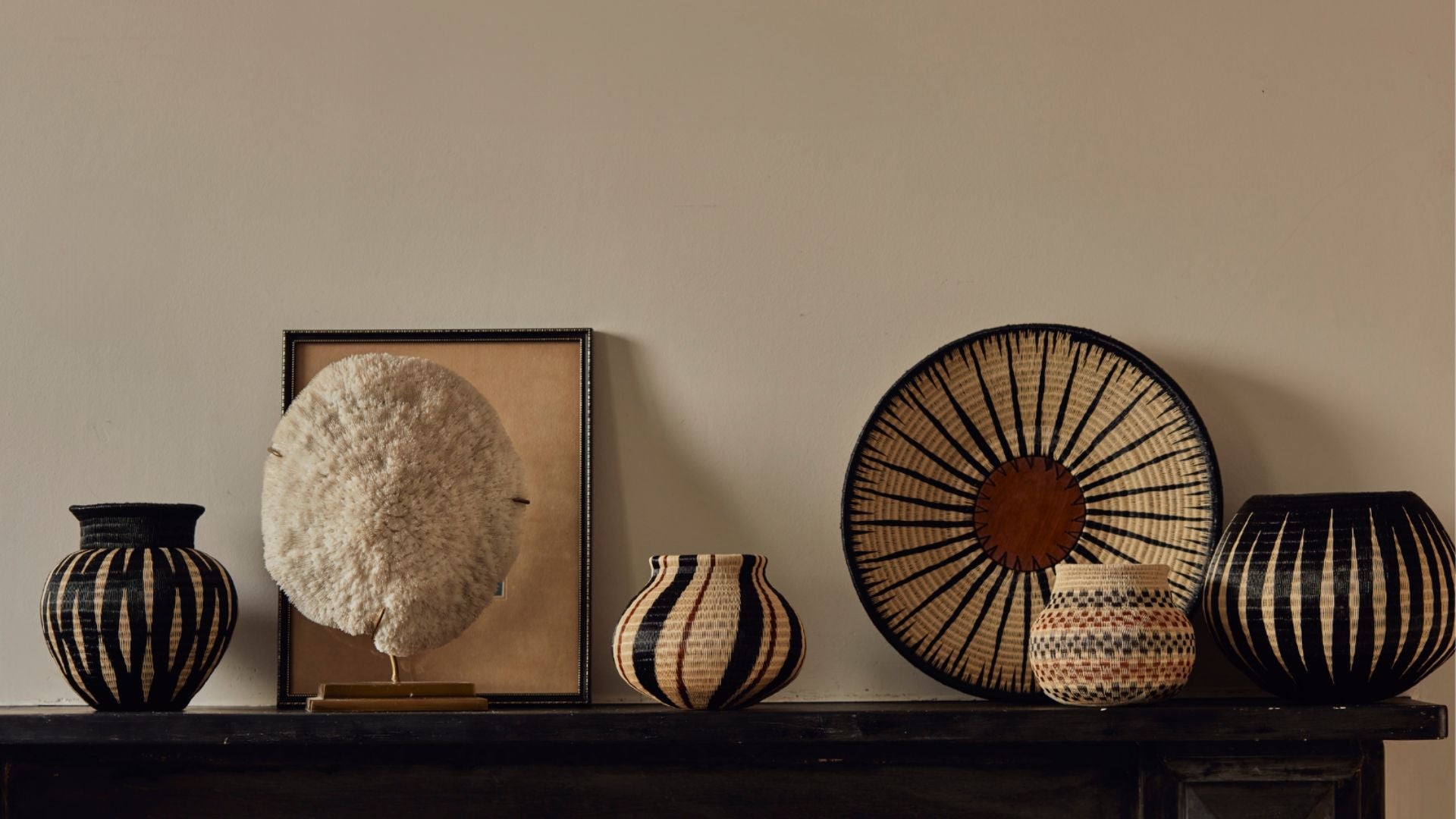 Werregue tabletop trays, fruit bowls and vasesin blackand white 