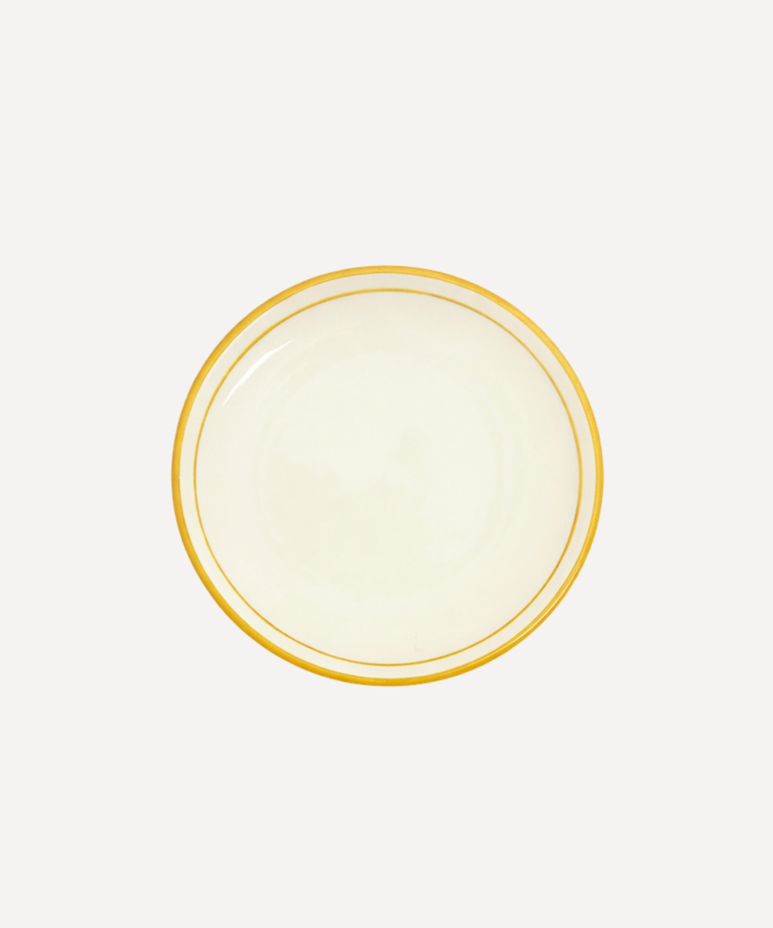 Rim Bread Plate in Golden Yellow — hand-painted rimmed ceramic from Carmen del Viboral, Colombia.