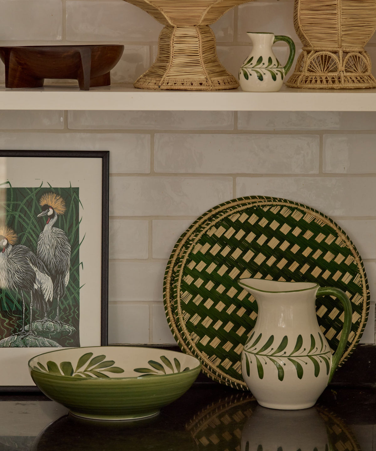 Fern Green Flor large salad bowl on the table, hand-painted floral ceramic from Carmen del Viboral