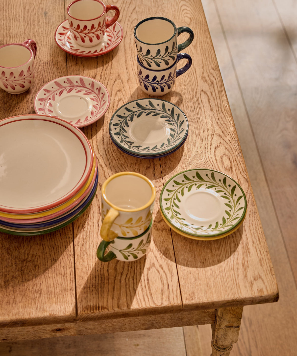 Rust Red Helecho espresso cup and saucer with freehand fern wreath, hand-painted ceramic