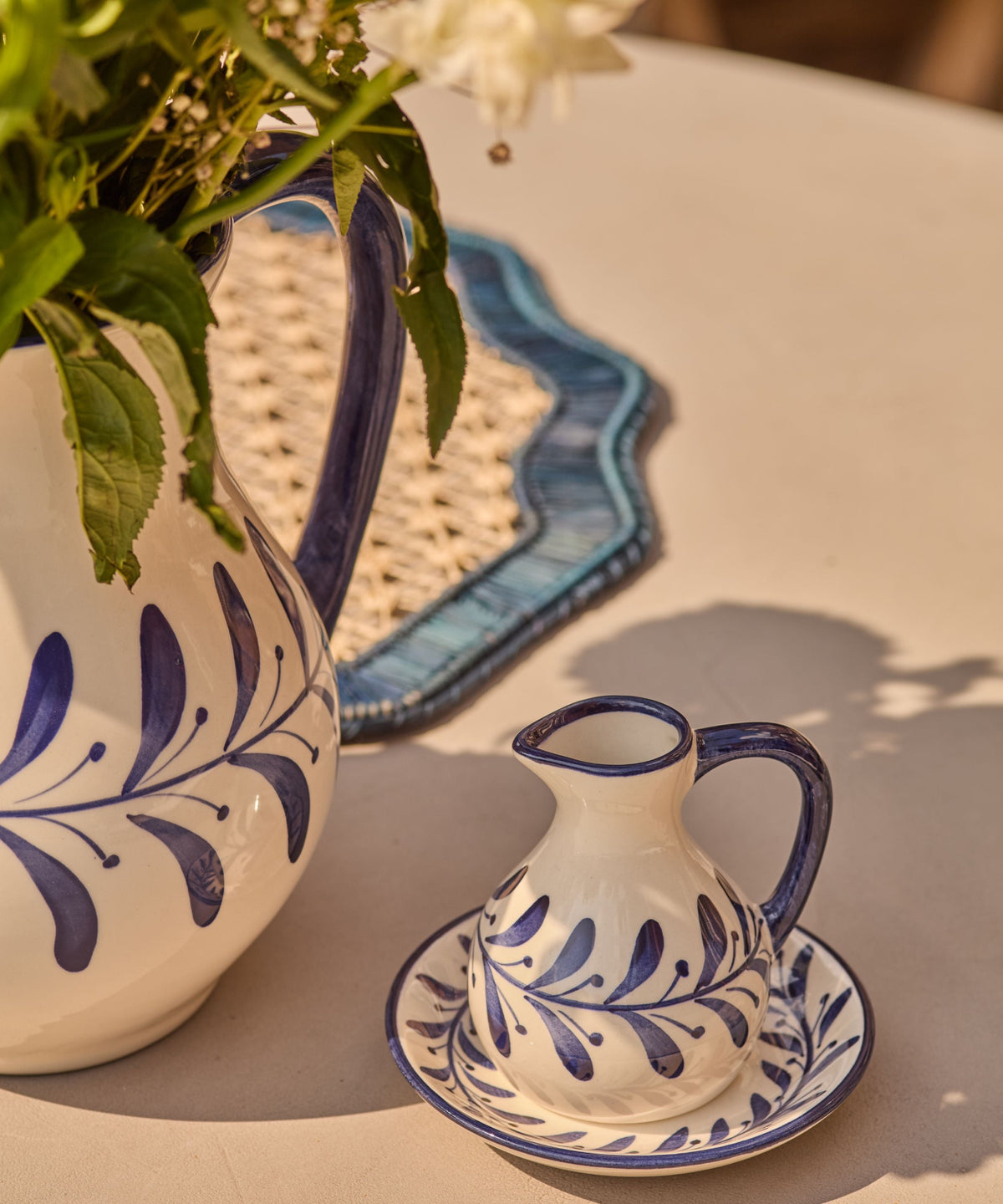 Hand-painted Helecho jug in Deep Blue styled on the table, Carmen del Viboral