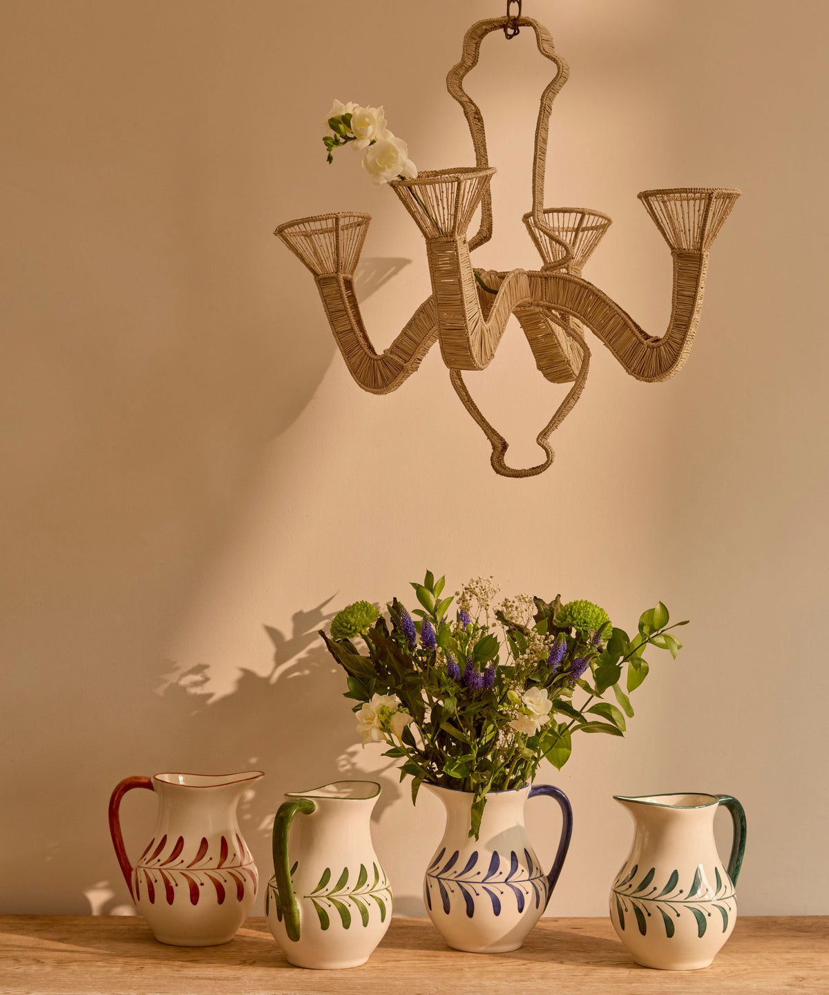 Hand-painted Helecho jug in Teal styled on the table, Carmen del Viboral