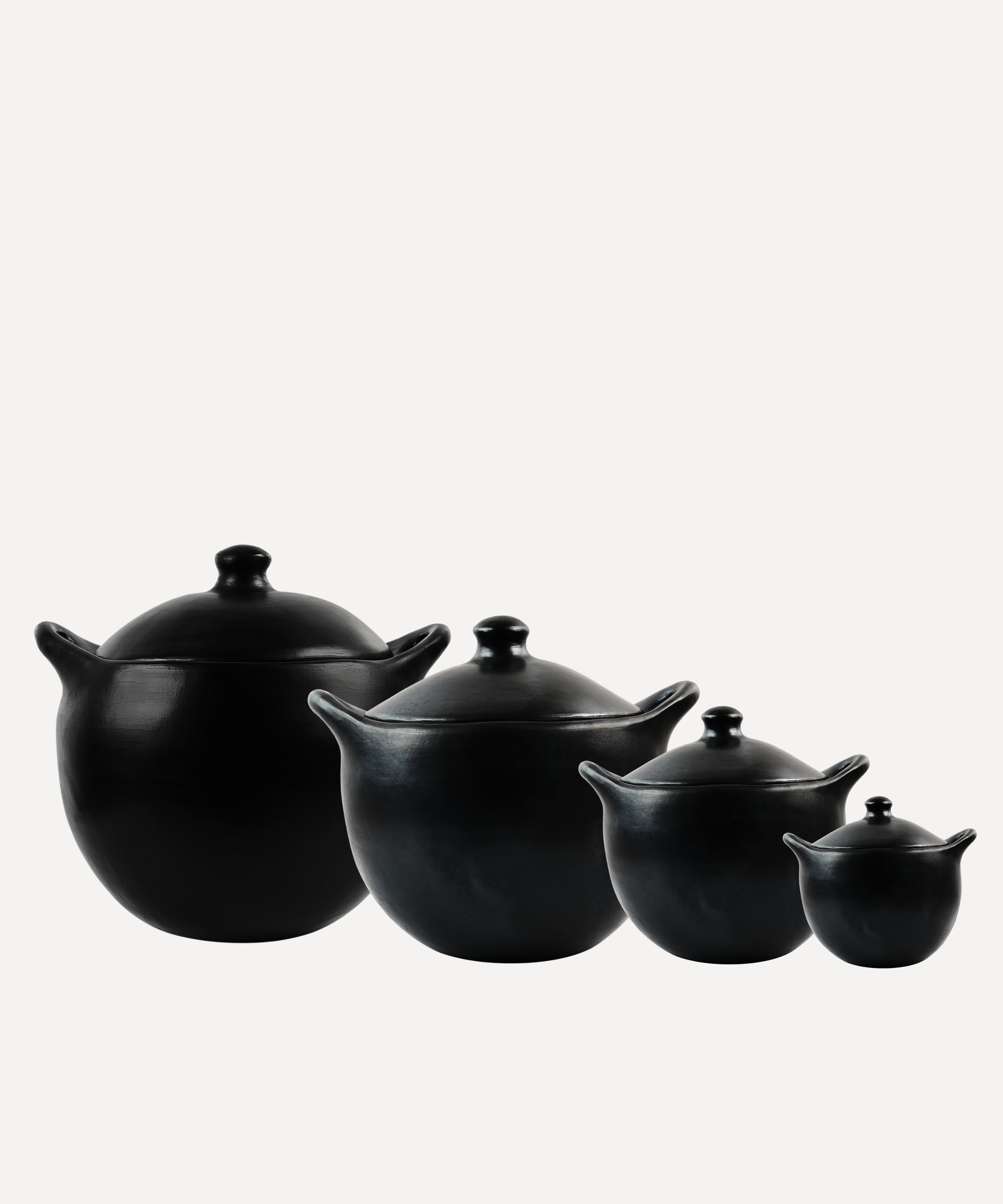 Chamba Cocotte detail — agate-polished natural black clay finish